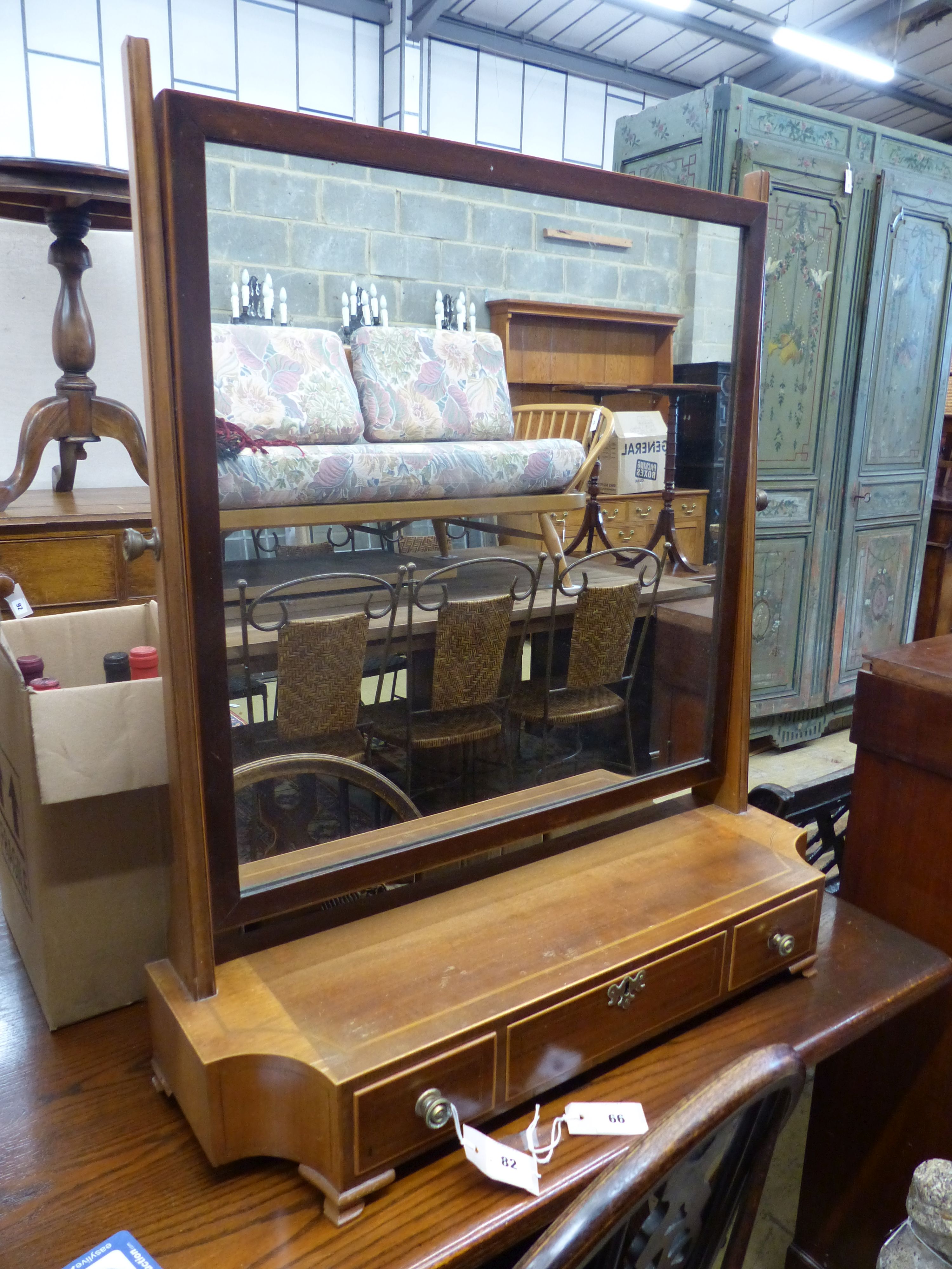 An Edwardian mahogany toilet mirror, width 71cm, depth 22cm, height 84cm
